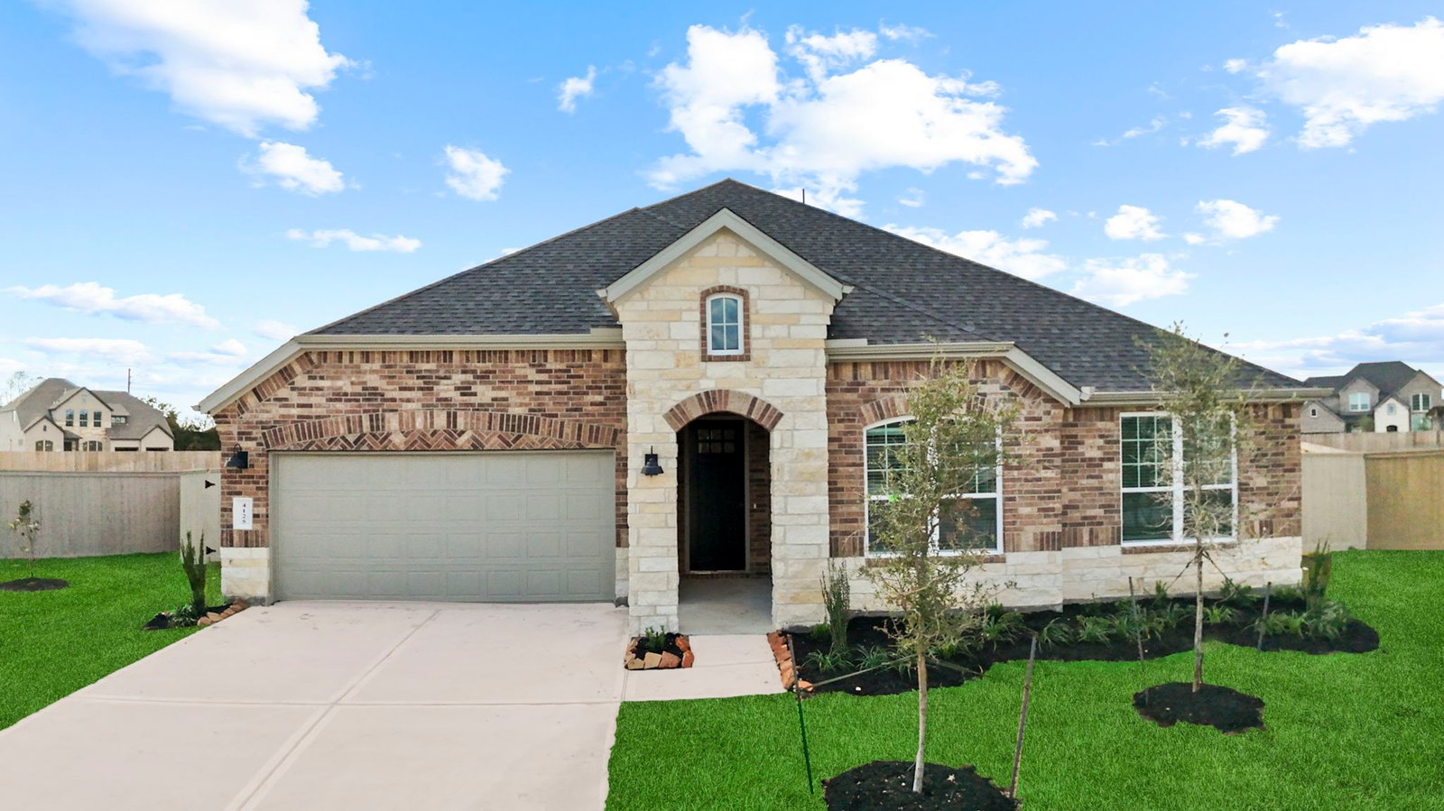 single story home with a two car garage