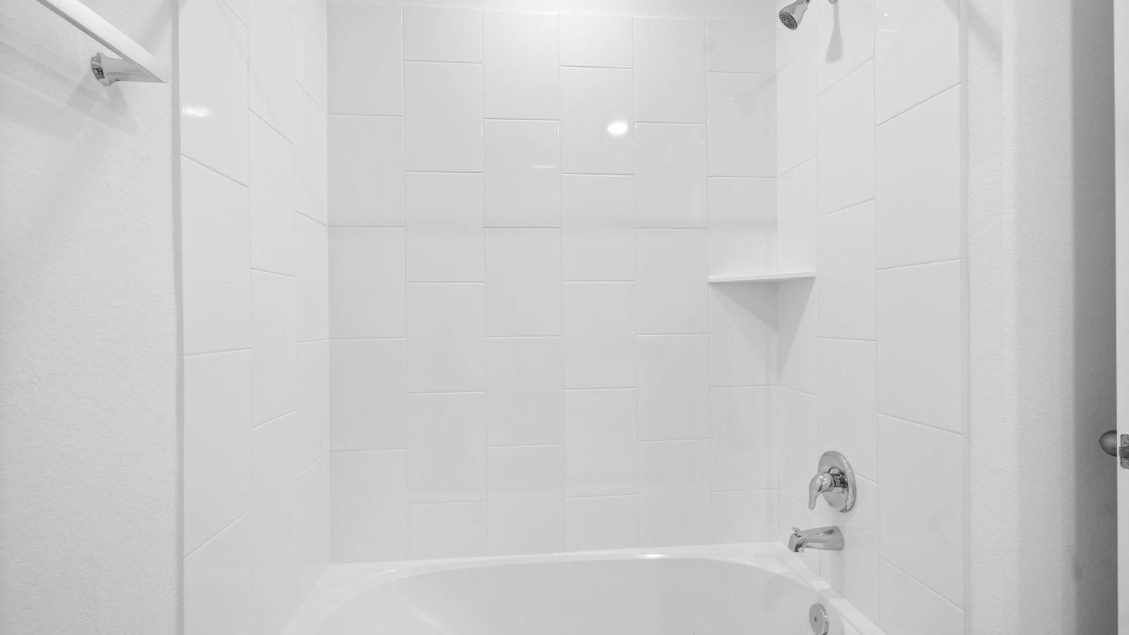 A well-designed bathroom equipped with granite countertops, emphasizing functionality and contemporary style.