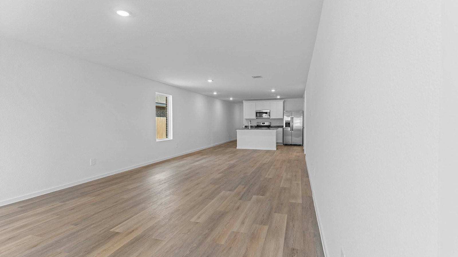 open concept kitchen and dining room