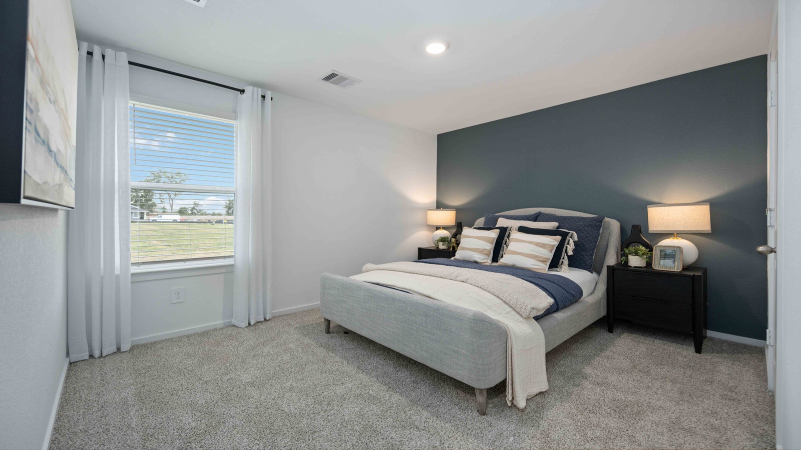 Secondary bedroom with one large windows