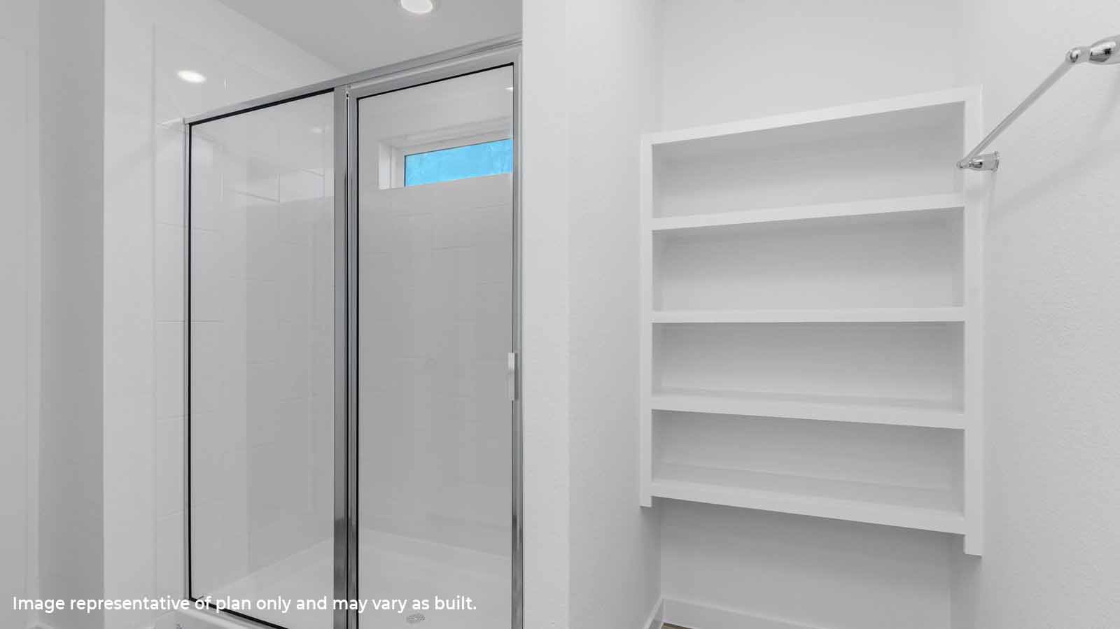 primary bathroom with shower and open shelving