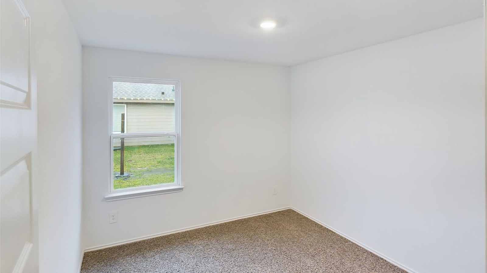 Secondary bedroom with one large window