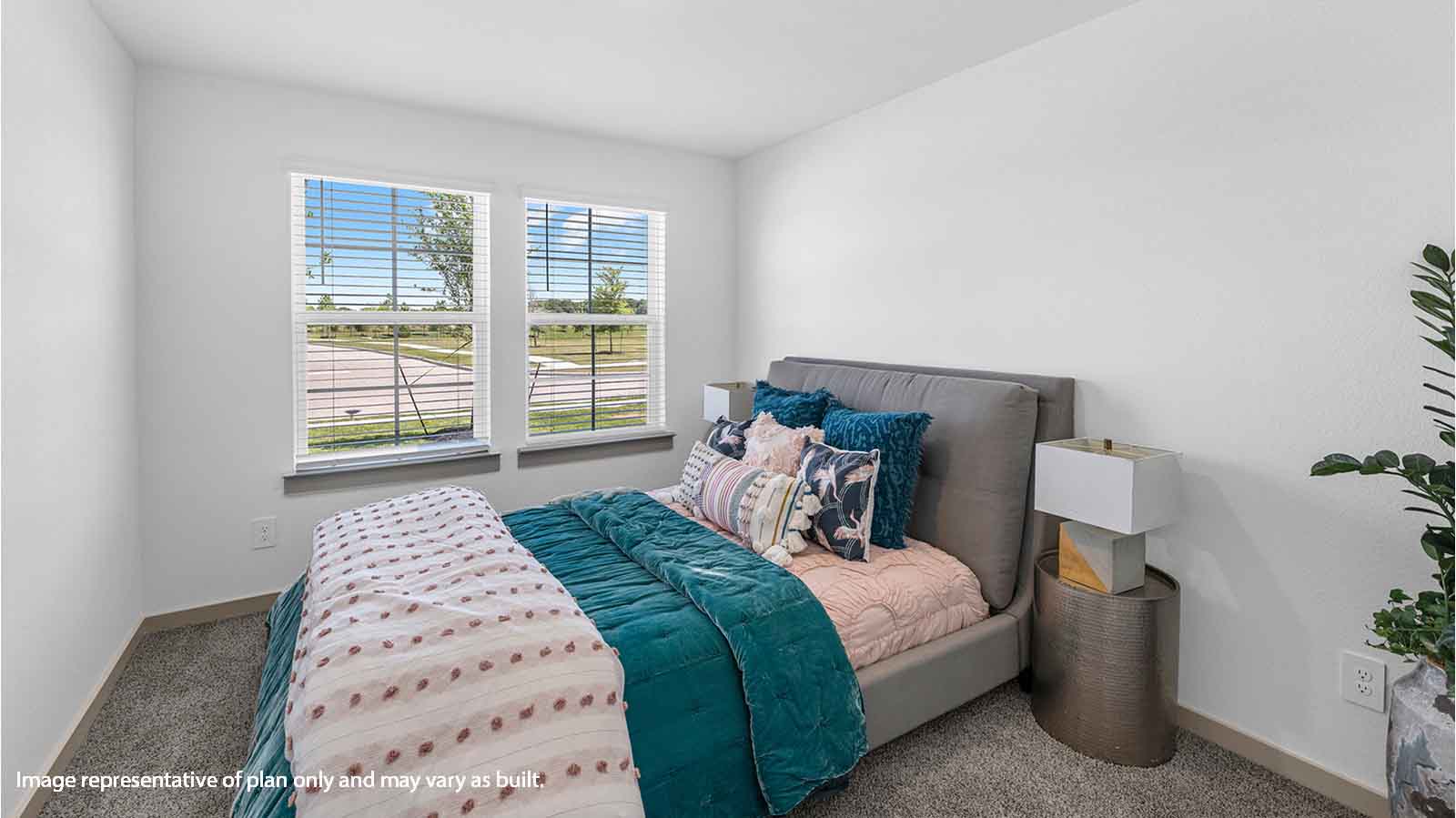 Secondary bedroom with two large mirrors
