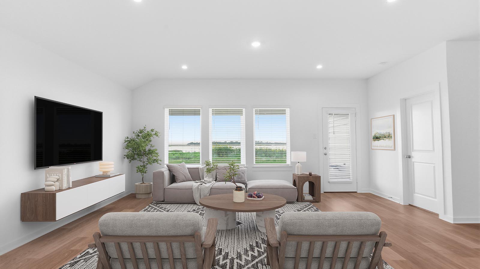 living room with three windows stagged