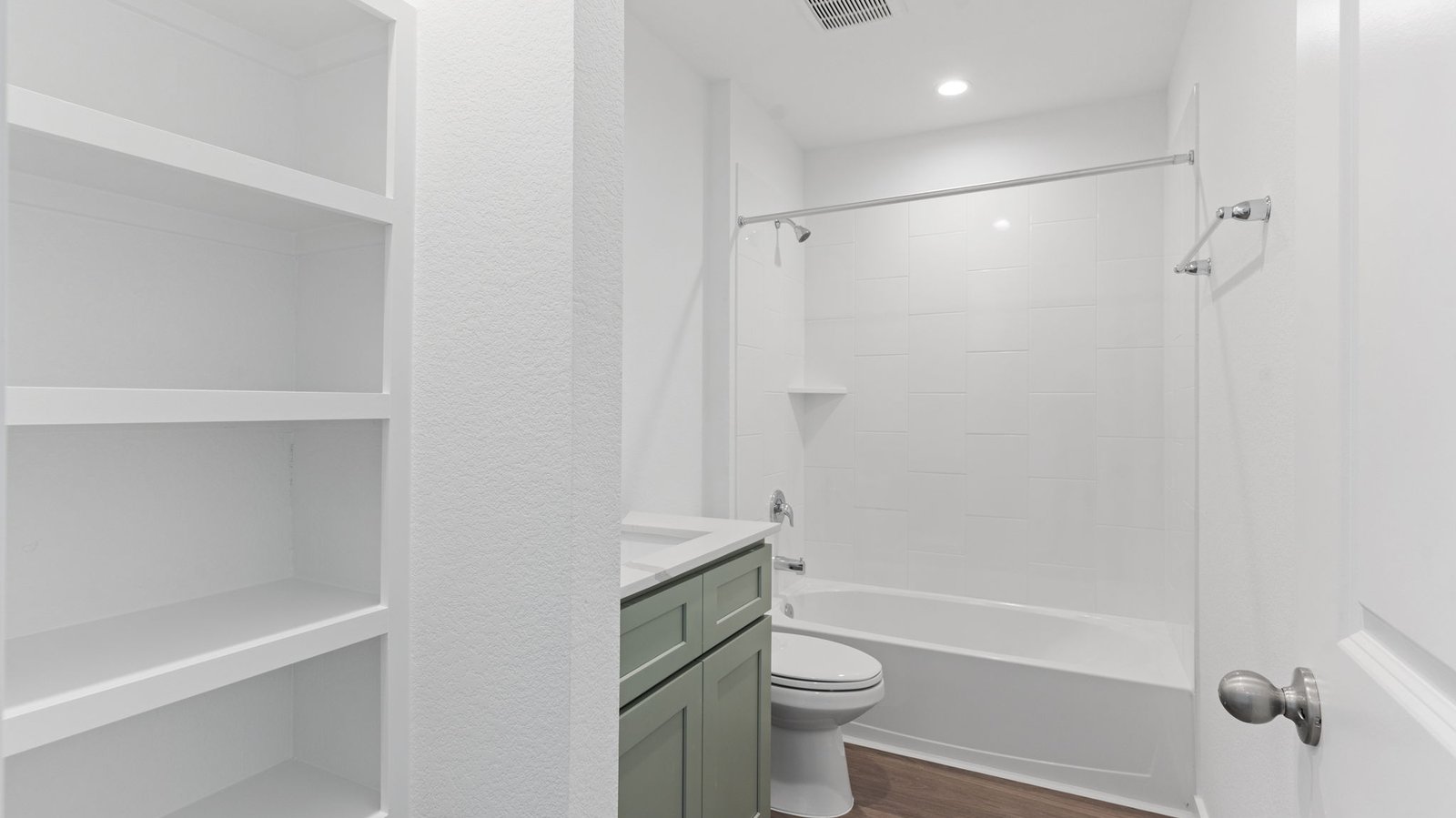 Interior bathroom with sink and full-sized shower