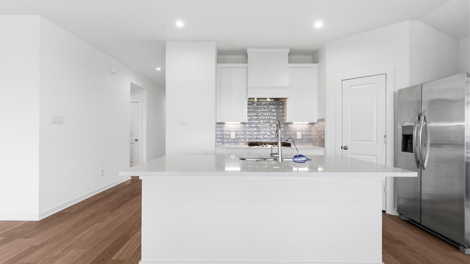 kitchen with large island and walk in pantry