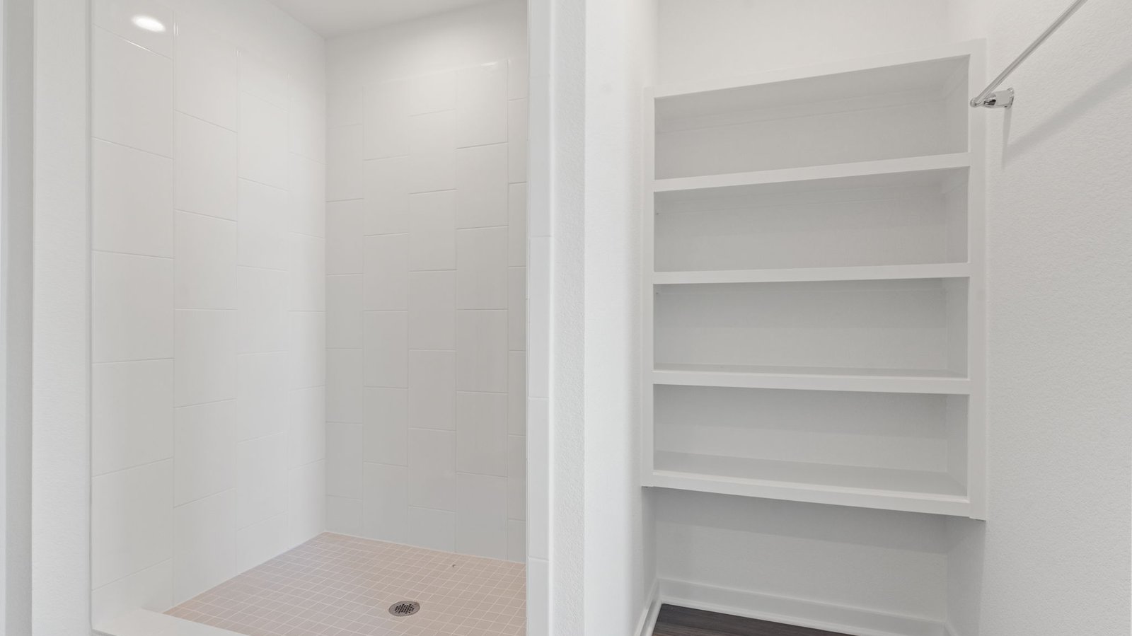 Interior bathroom with shower and shelving
