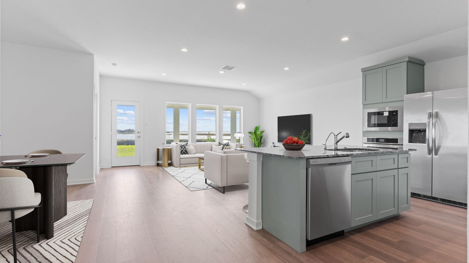 Interior kitchen with center island open to living area