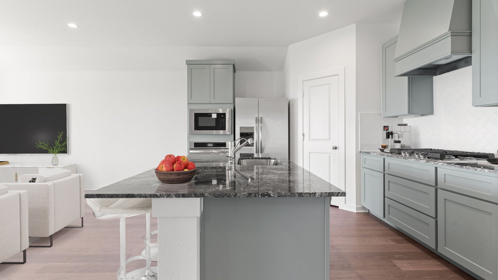 Interior kitchen with center island open to living area