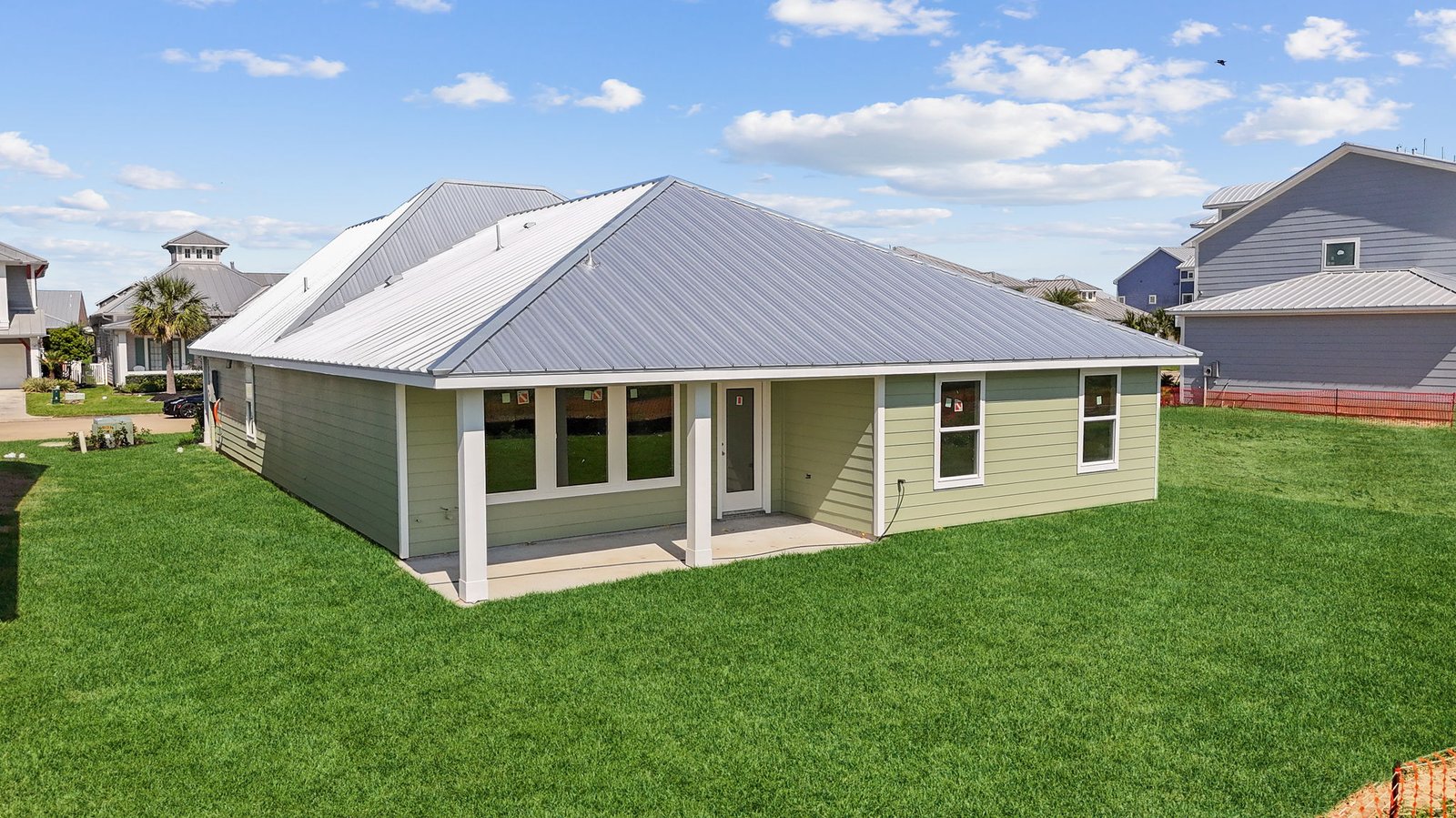 Covered back patio and backyard with sod