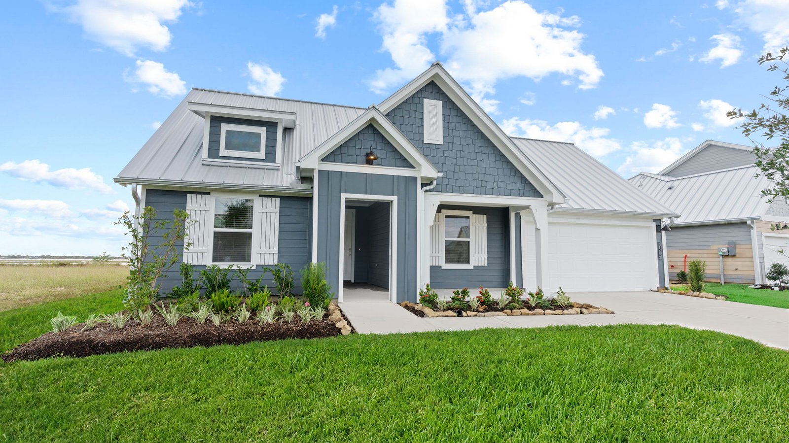 Single story brick home with a two car garage