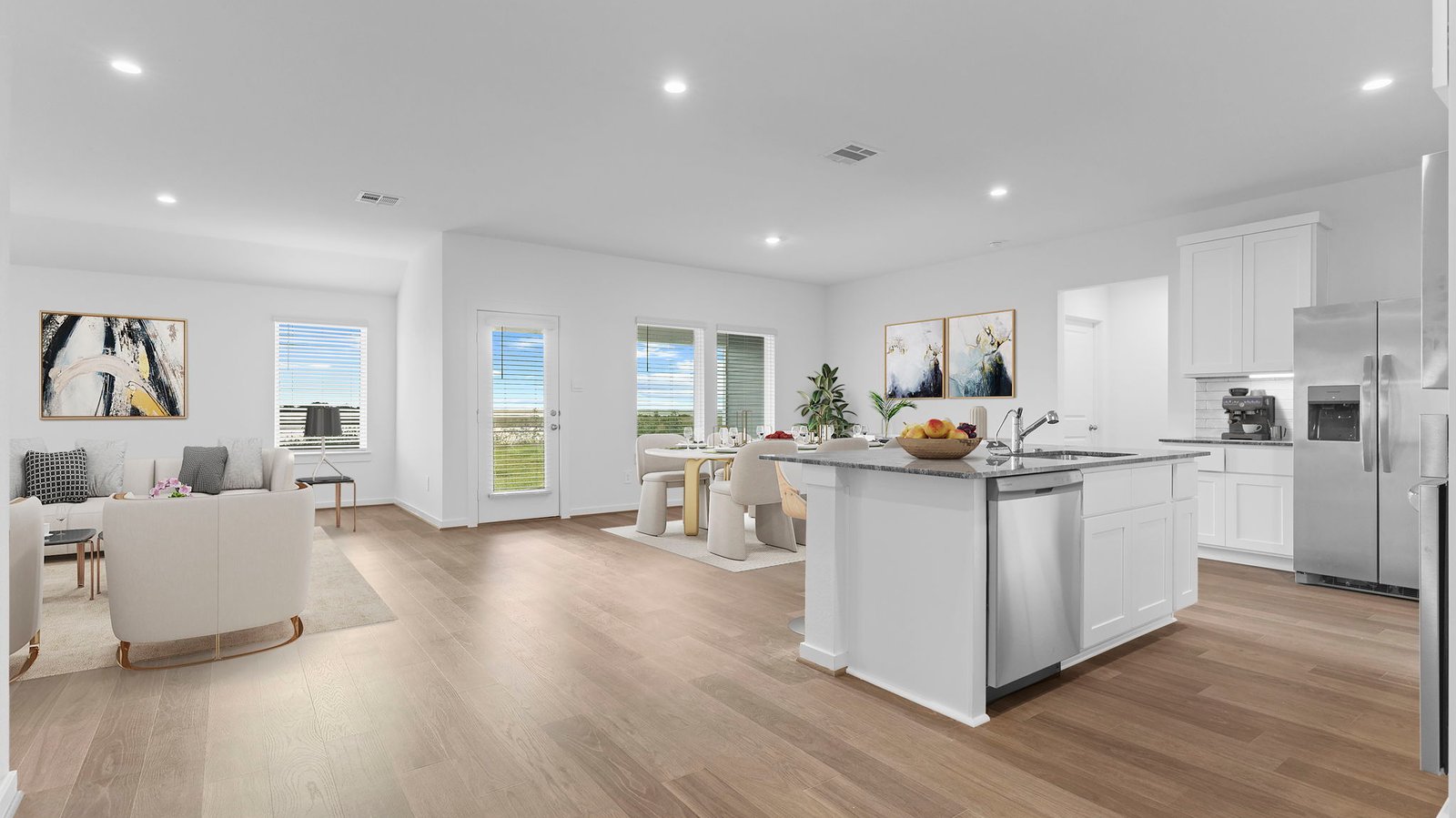 open concept living dining and kitchen