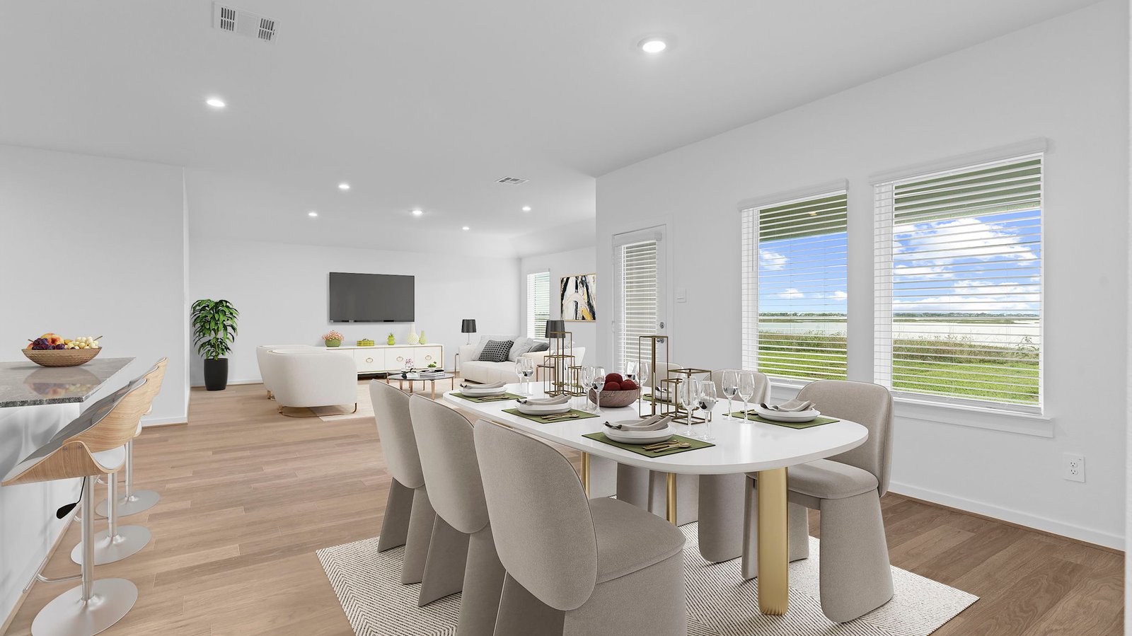 open concept dining room with two windows