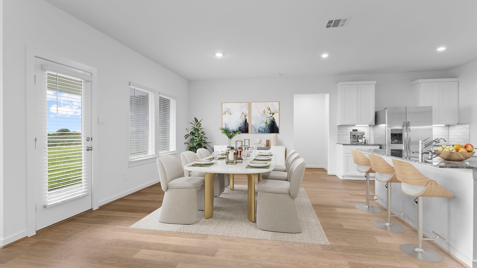 open concept dining room with two windows