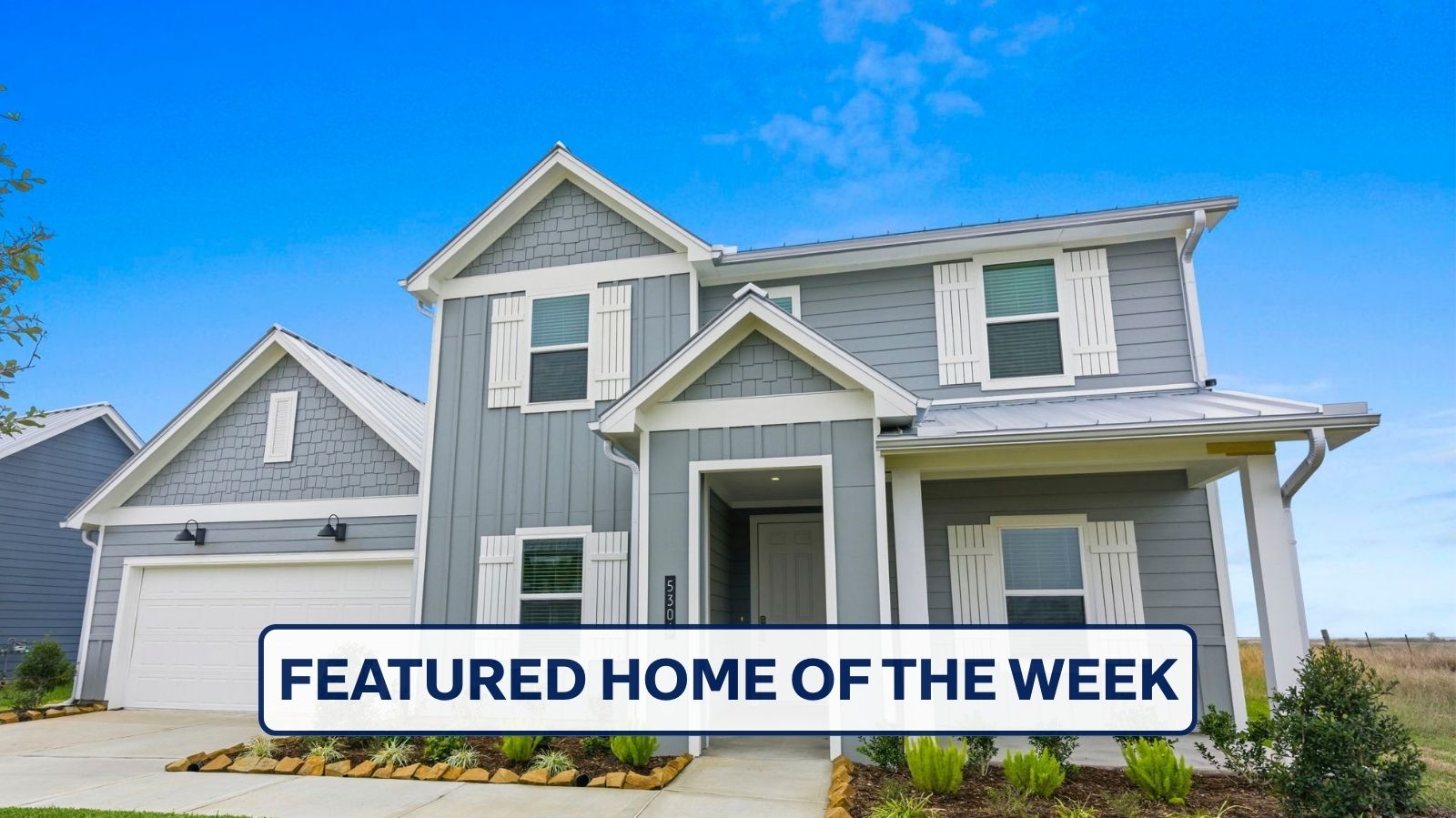two story home with a two car garage