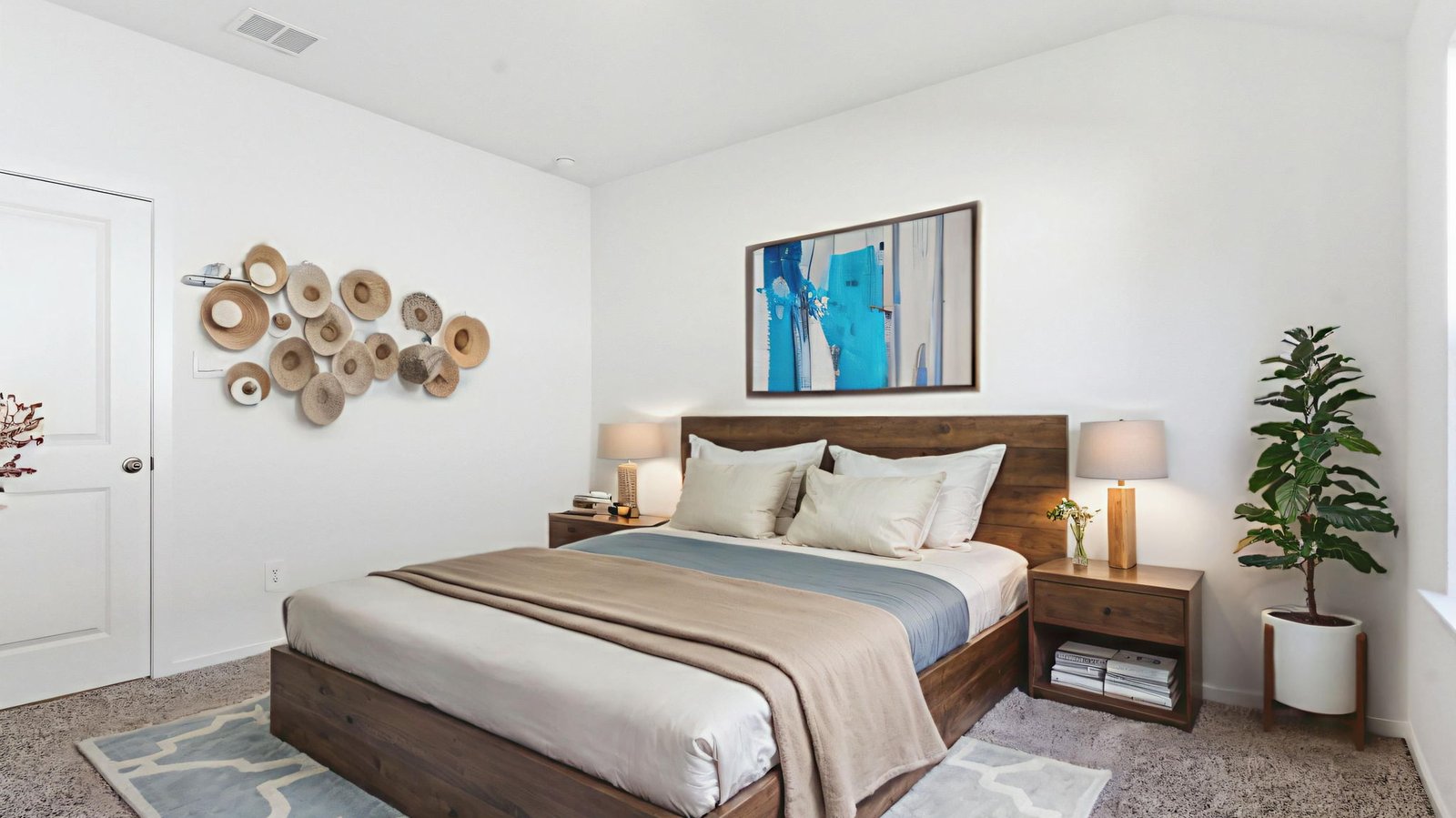A vibrant bedroom showcasing a neatly made bed, a stylish dresser, and a playful painting that adds charm.