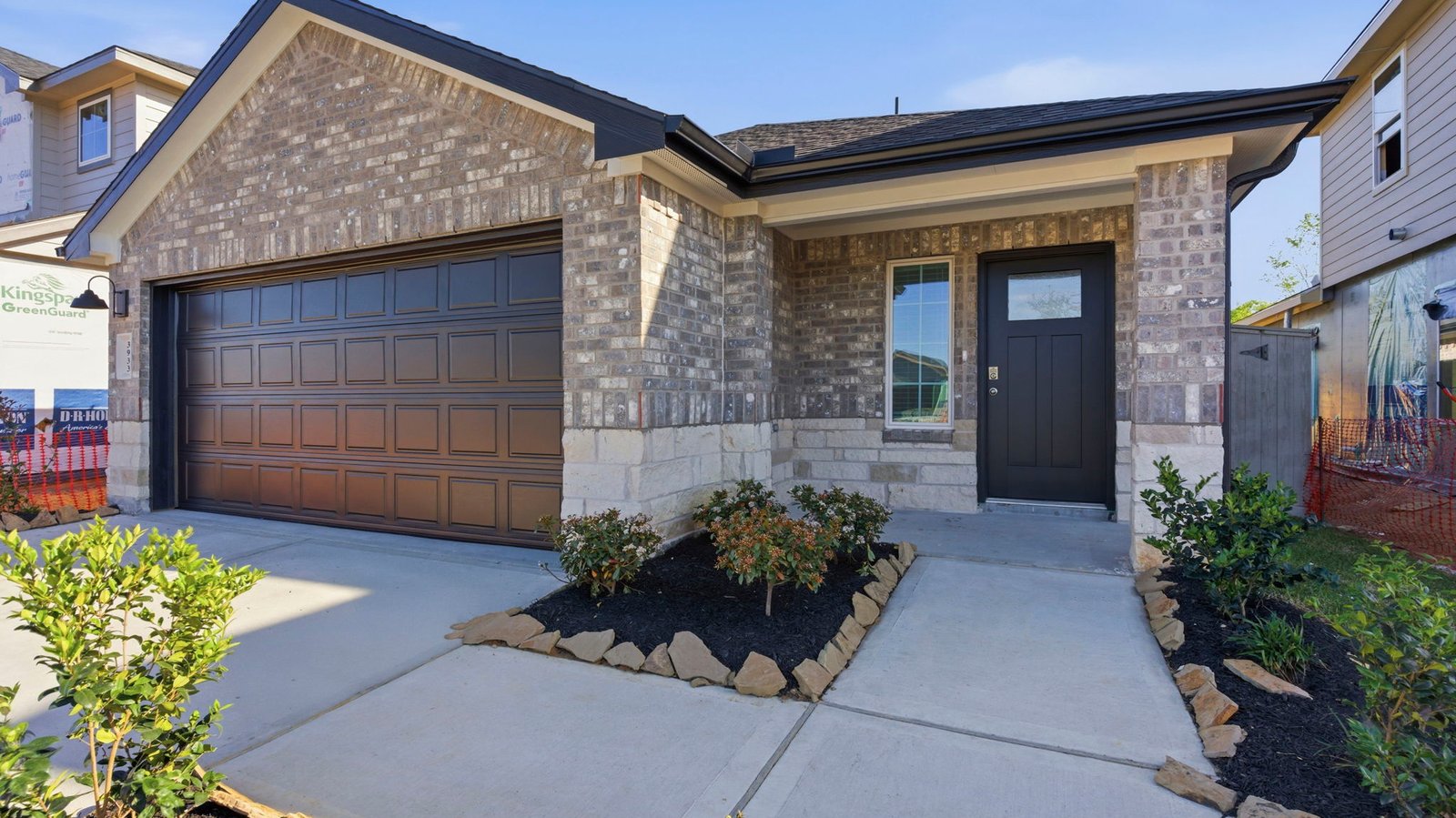 single story home with a two car garage