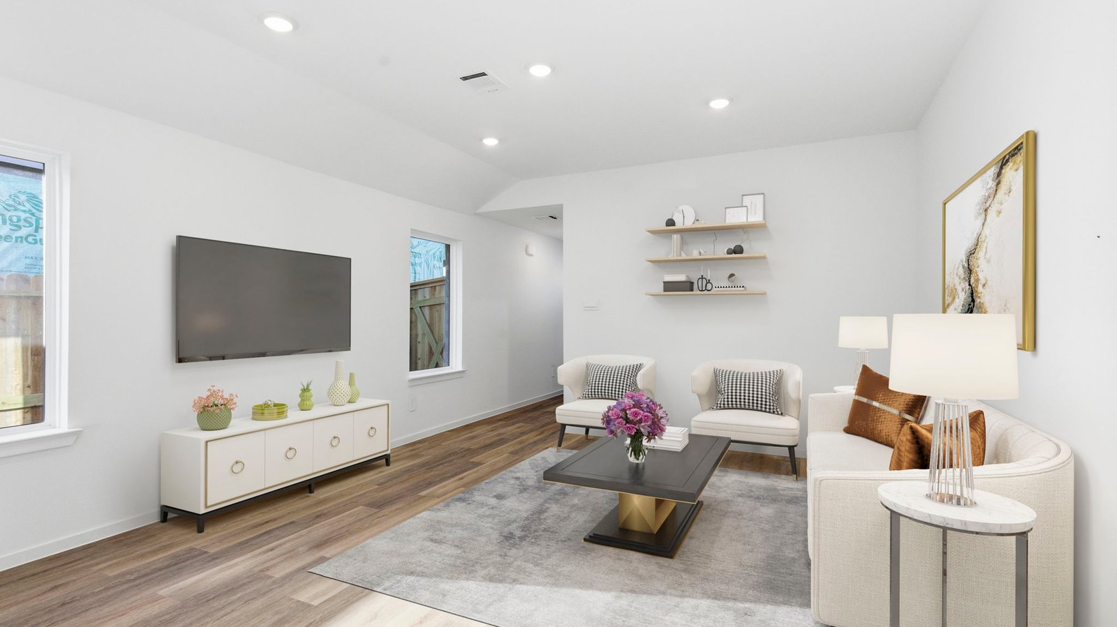 open concept living room with two window
