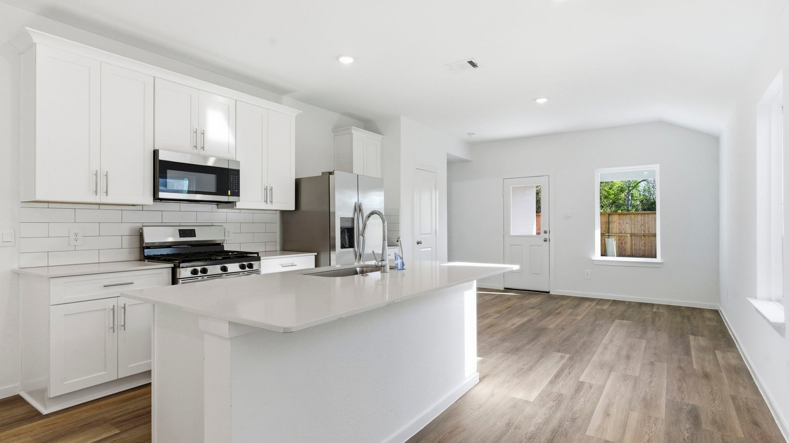 kitchen with large island and walk in pantry