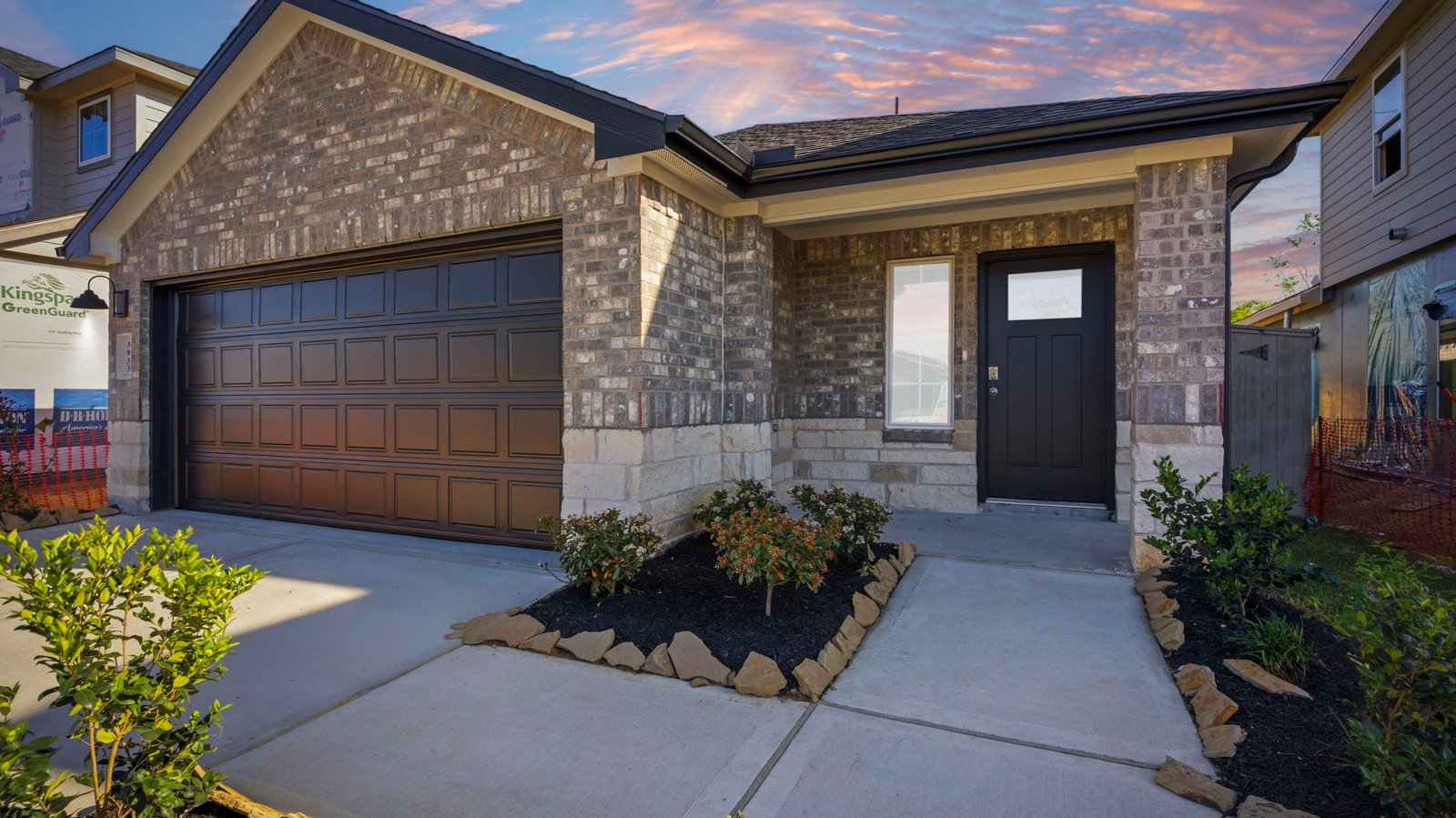 single story home with a two car garage