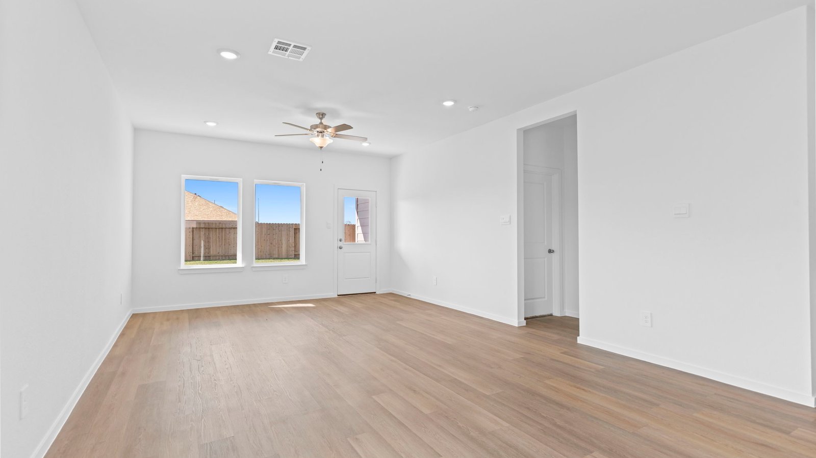open concept living room with large window
