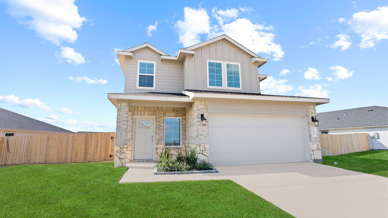 two story home with a two car garage