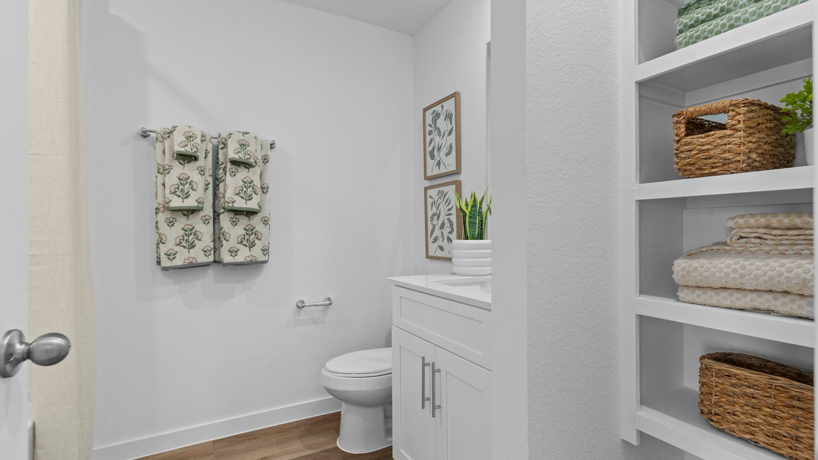 A well-designed bathroom equipped with granite countertops, emphasizing functionality and contemporary style.