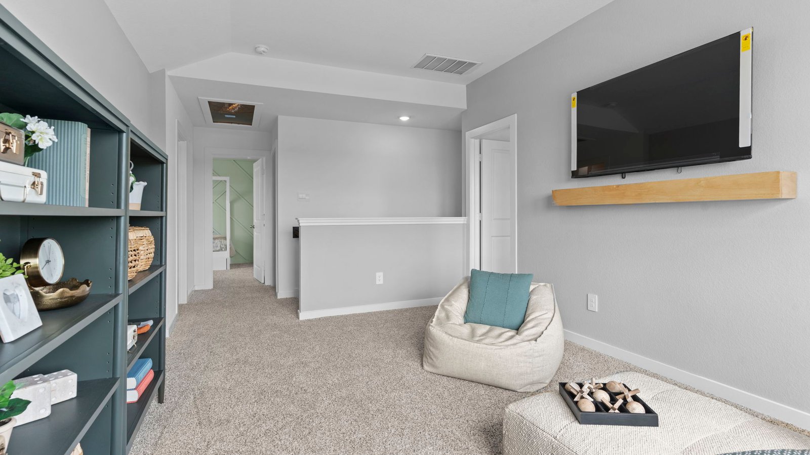 upstairs game room with large window