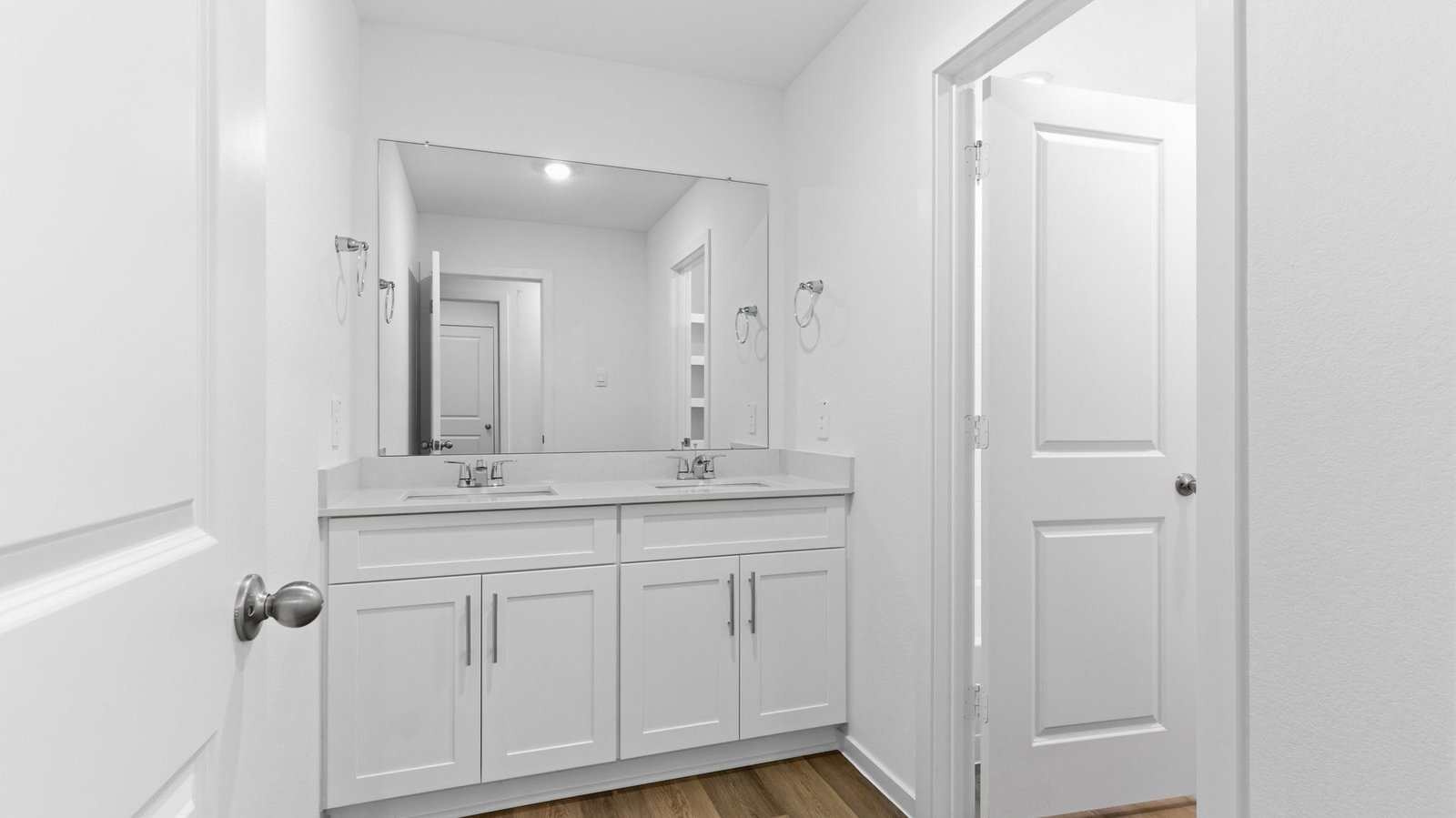 A well-designed bathroom equipped with granite countertops, emphasizing functionality and contemporary style.