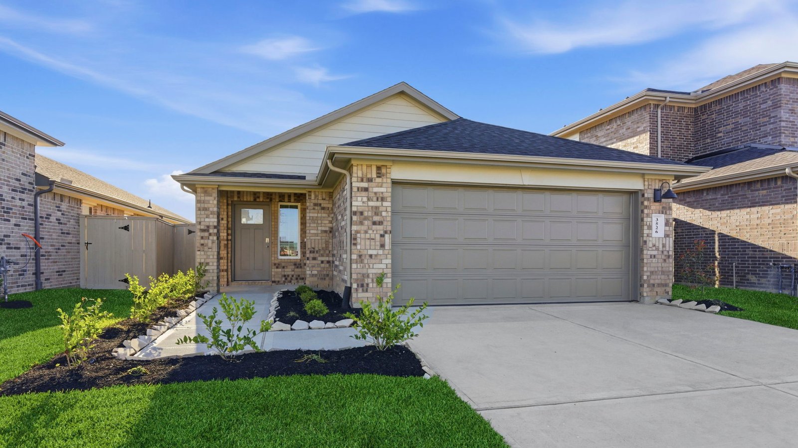 one story home with a two car garage