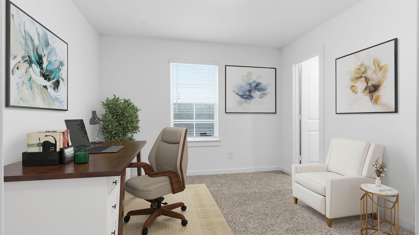 A bedroom shown as an at home office with a bright window allowing natural light to enter.