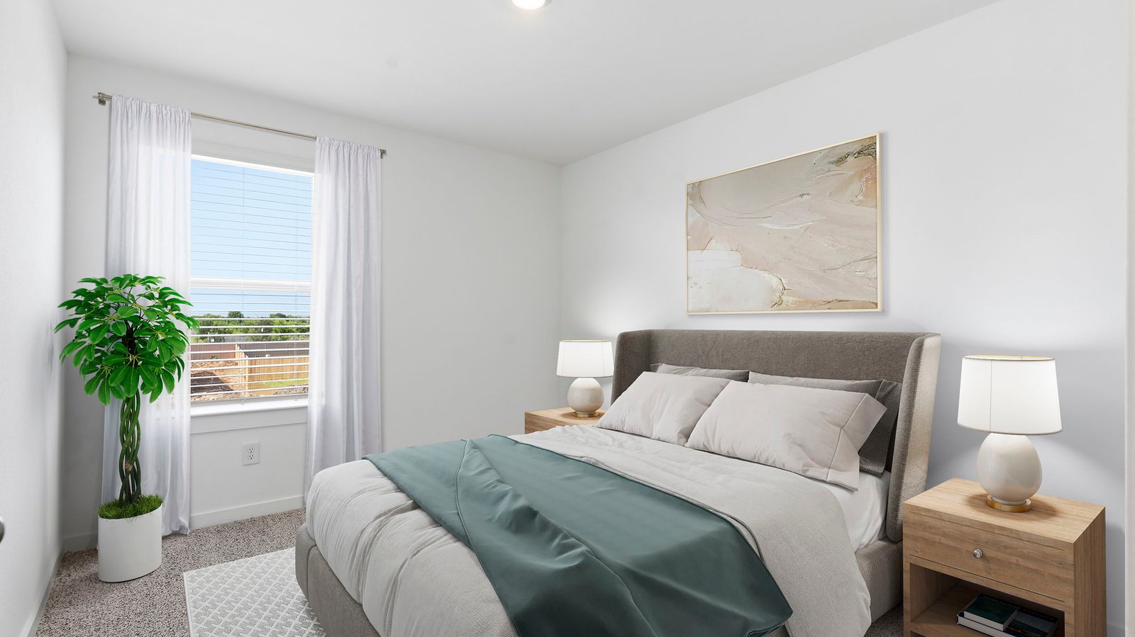 Comfortable guest bedroom featuring neutral-toned walls, carpeted flooring, and a separate closet.