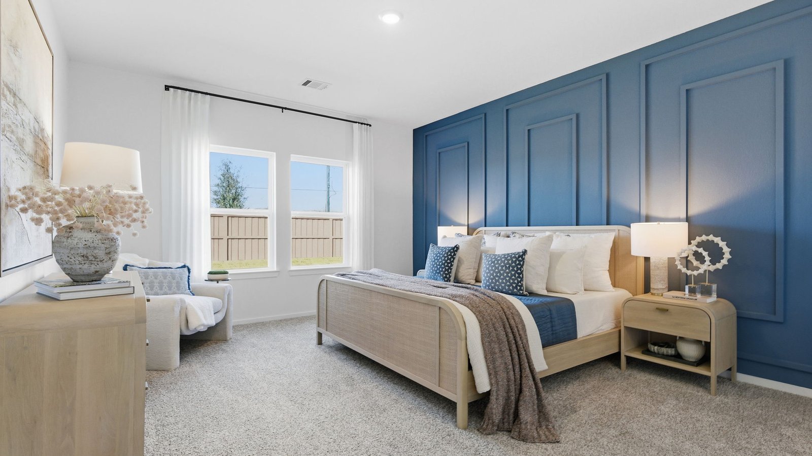 primary bedroom with two windows