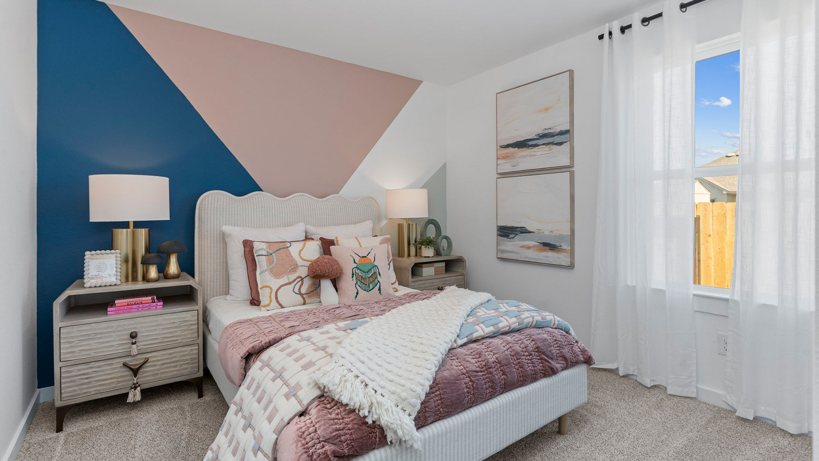 Comfortable guest bedroom featuring neutral-toned walls, carpeted flooring, and a separate closet.