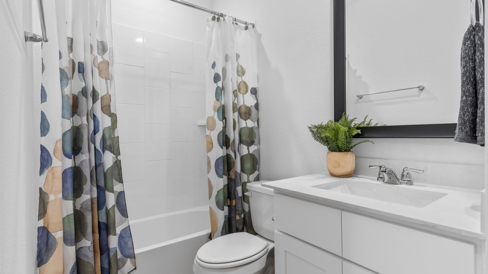 secondary bathroom with one sink