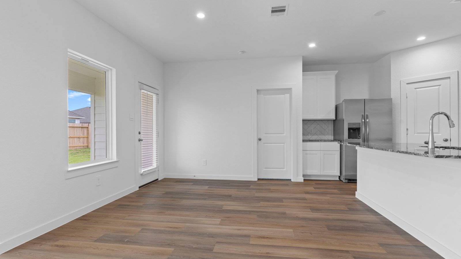 open concept kitchen and dining room