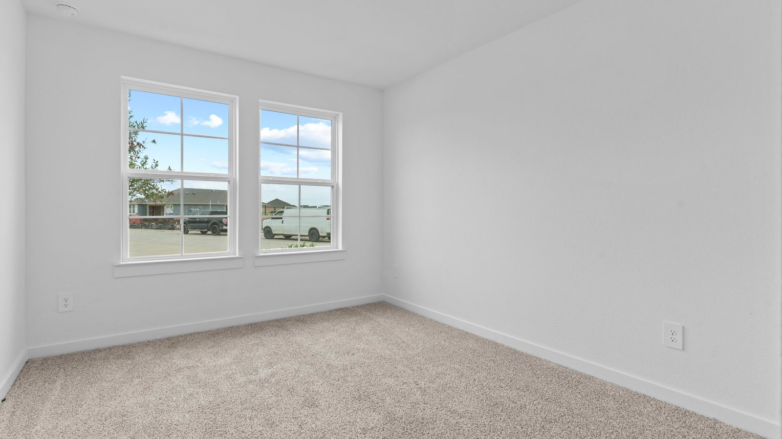 secondary bedroom with large window