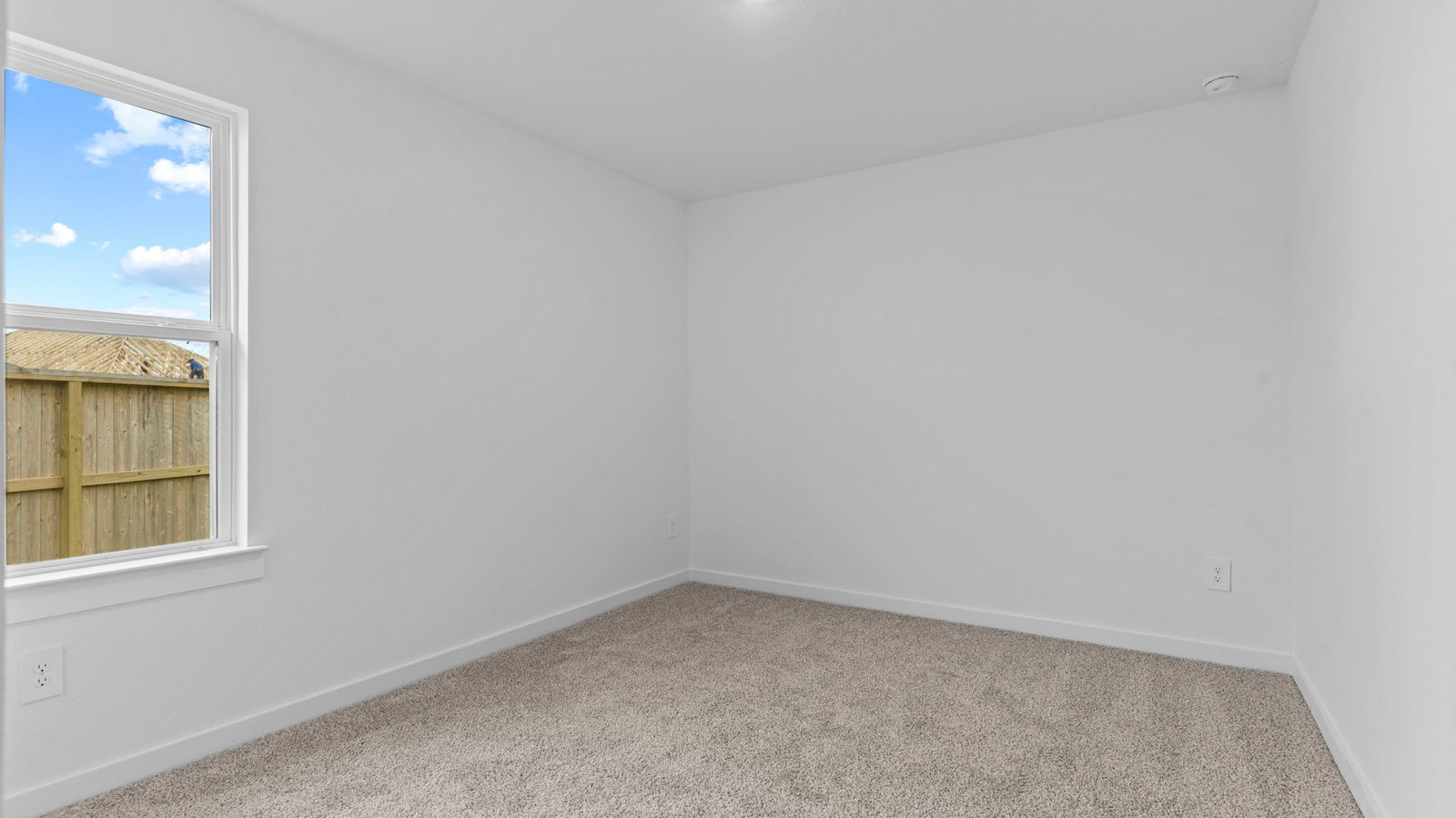 secondary bedroom with large window
