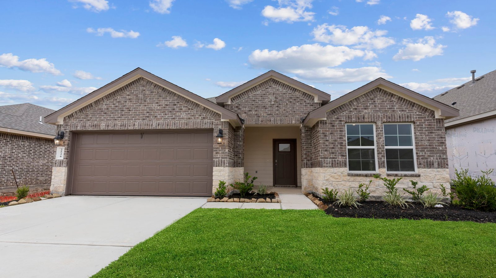 single story home with a two car garage