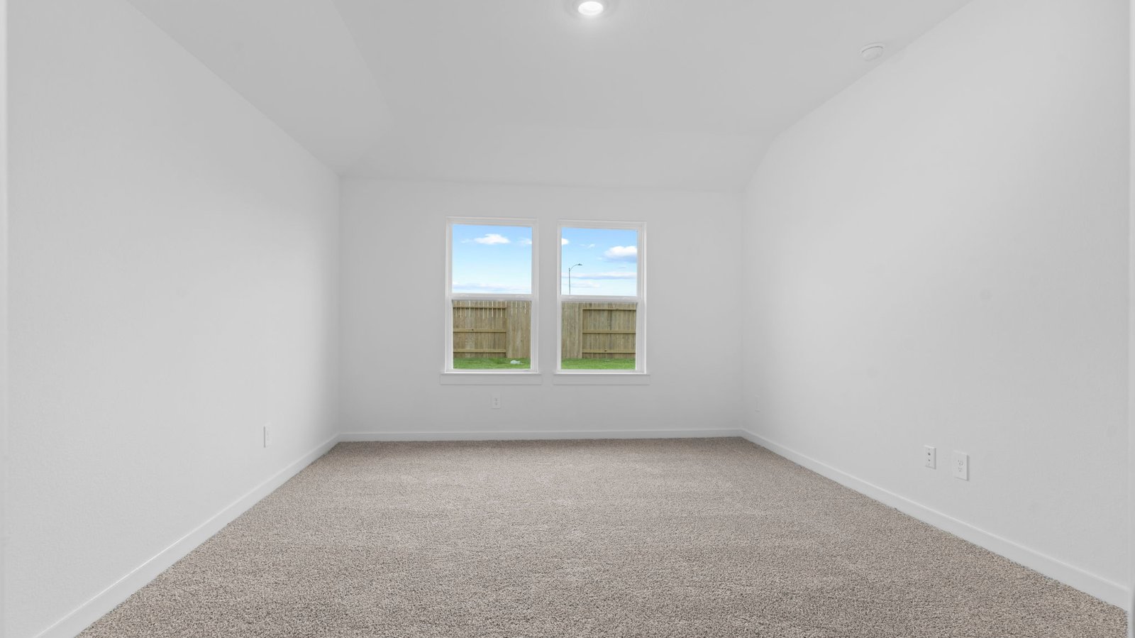 primary bedroom with large window