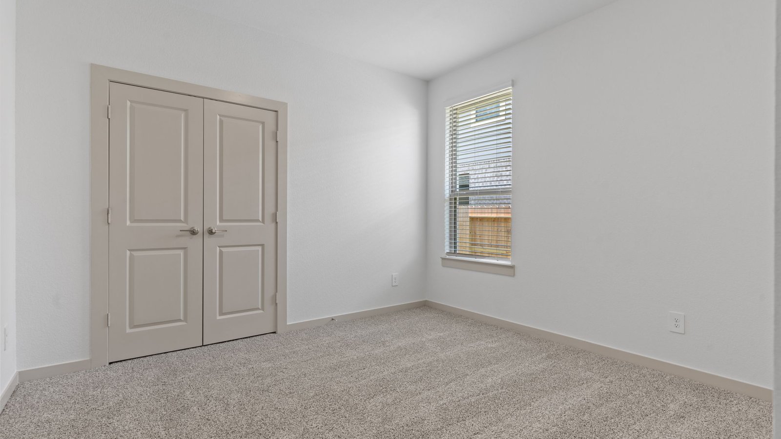 secondary bedroom with window