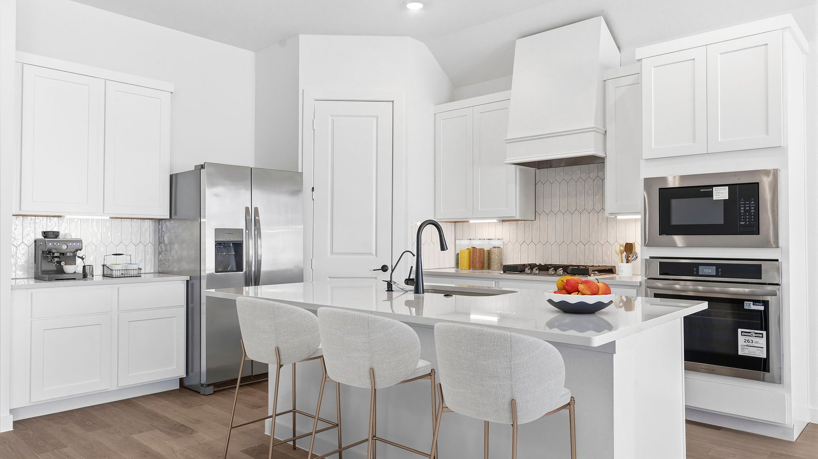 kitchen with large island and walk in pantry
