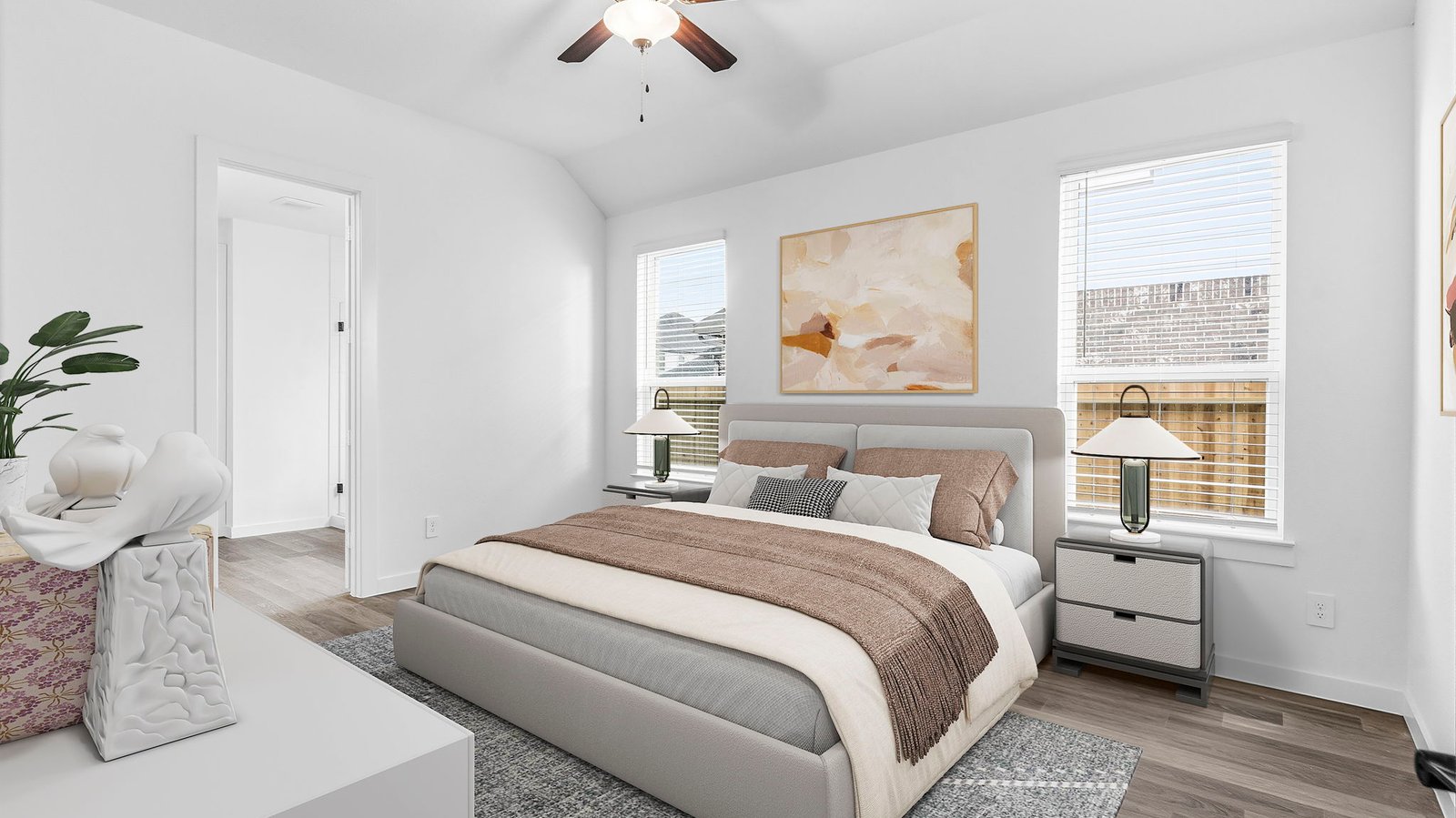 primary bedroom with two windows