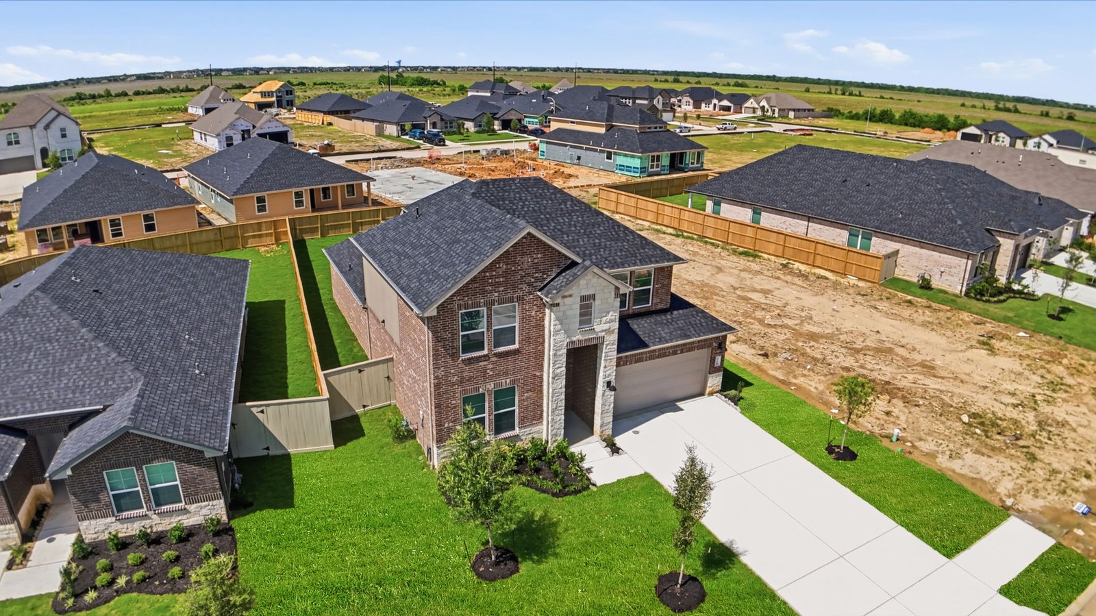 An aerial view of the home to view the size of the driveway and the size of the home