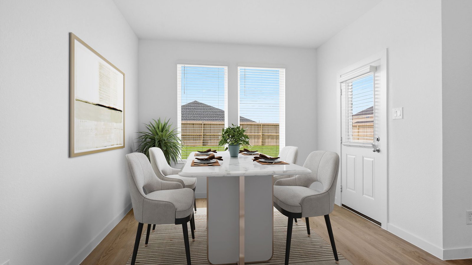A separate dining room with large windows for maximum natural lighting and a gorgeous view of the backyard
