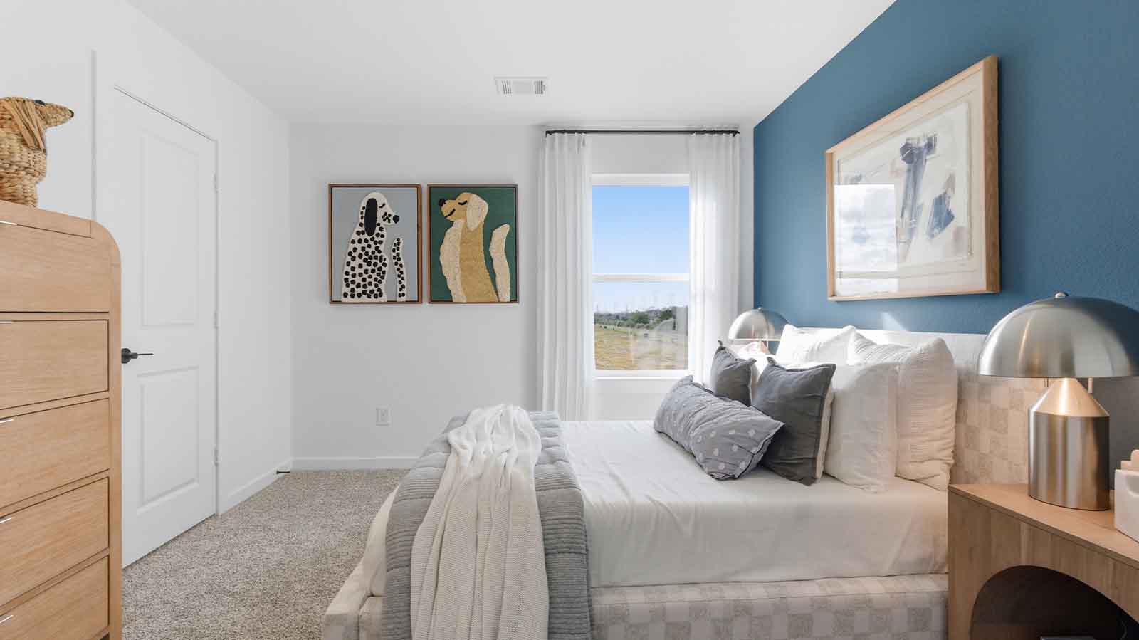 secondary bedroom with large windows