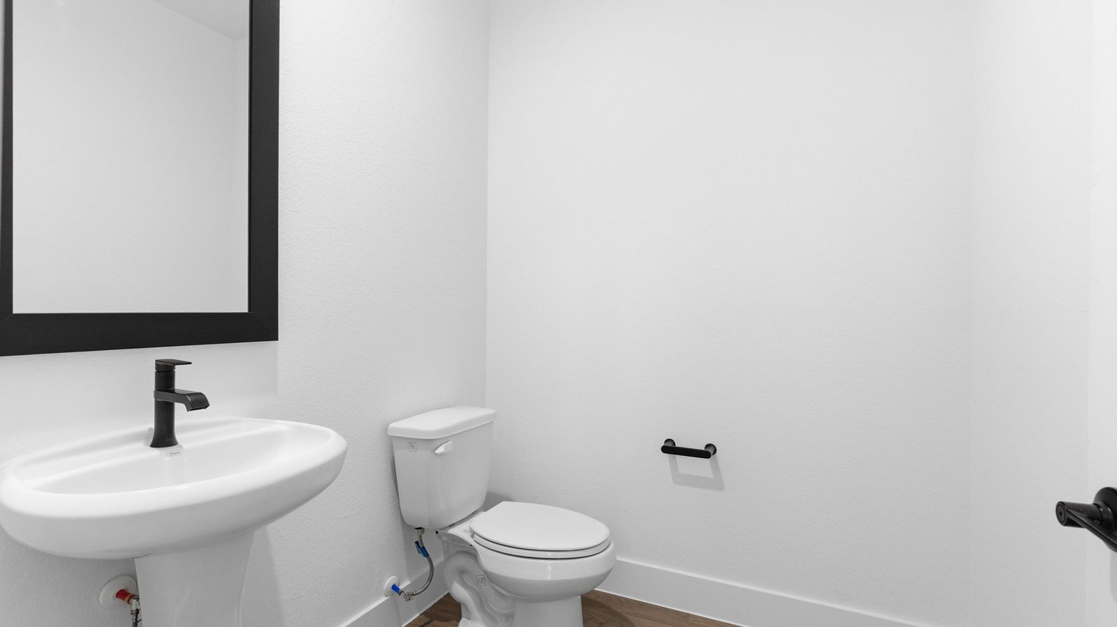 A decorate downstairs half bathroom for guests