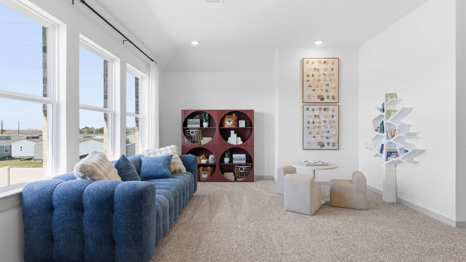 upstairs game room with large windows