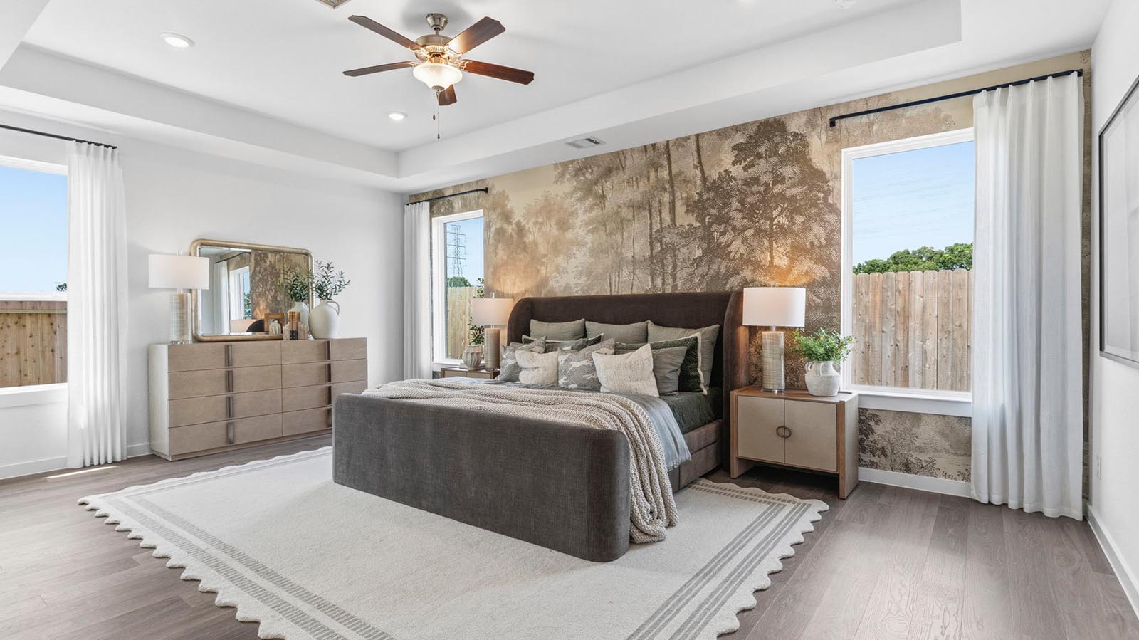 primary bedroom with two windows