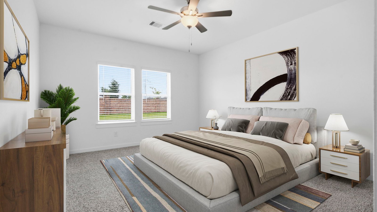 A spacious primary bedroom emphasizing open space and natural lighting with large windows.
